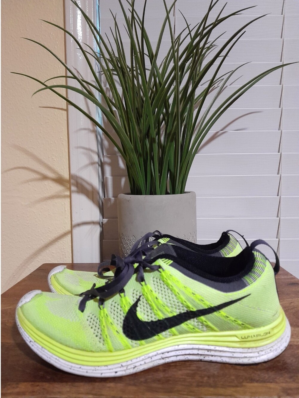 Nike Women's Neon Yellow and Black Flyknit Running Sneakers